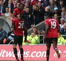 Report : Swansea 1 United 4